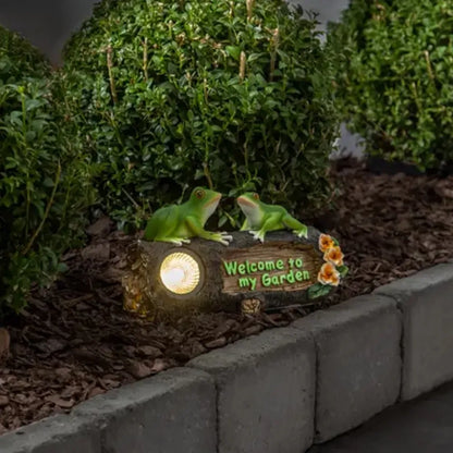 Lauko LED lempa „Frogy“ su saulės baterija (24 × 14 cm)
